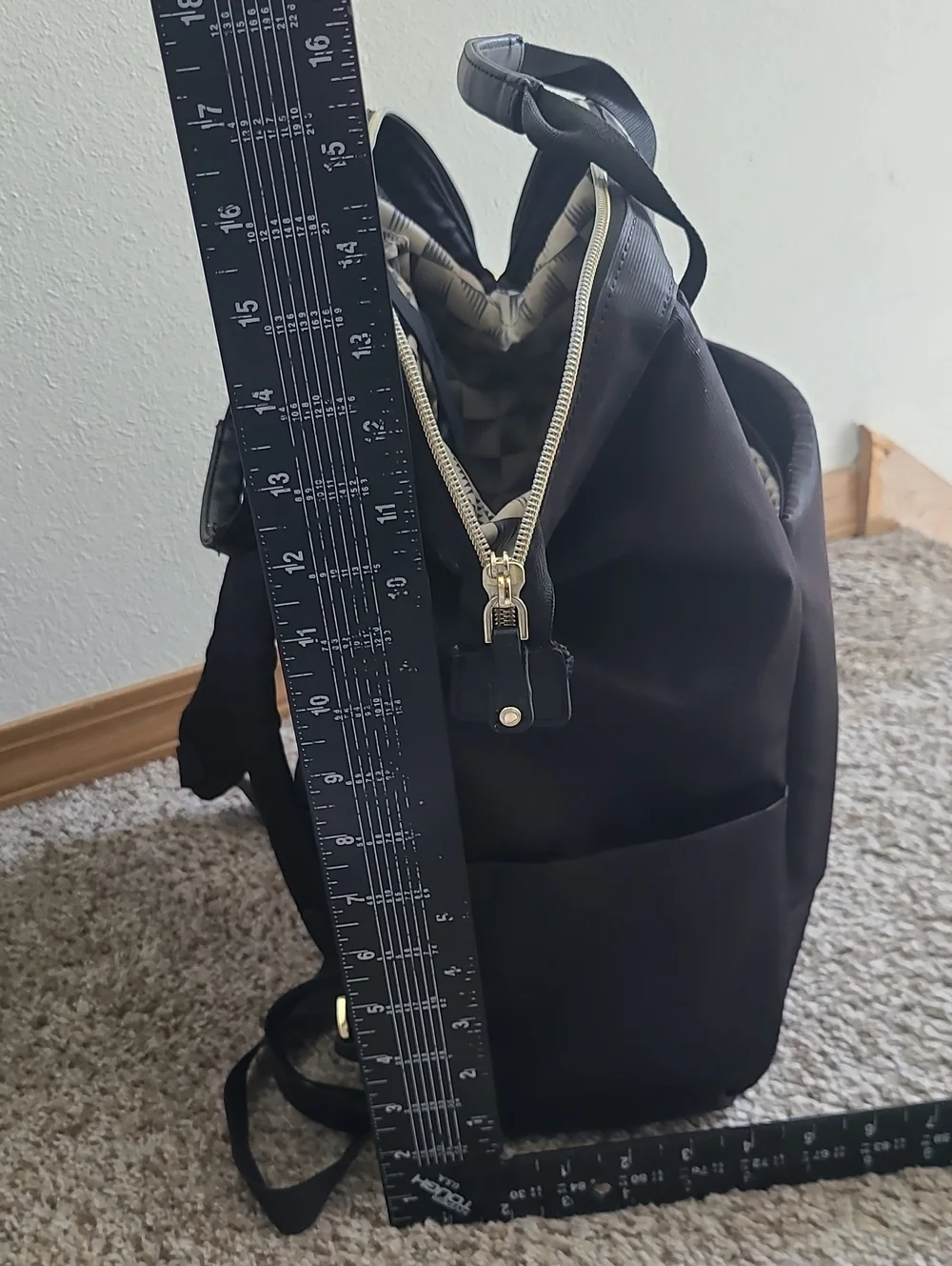 Delsey Paris Black Laptop Backpack with Gold Accent